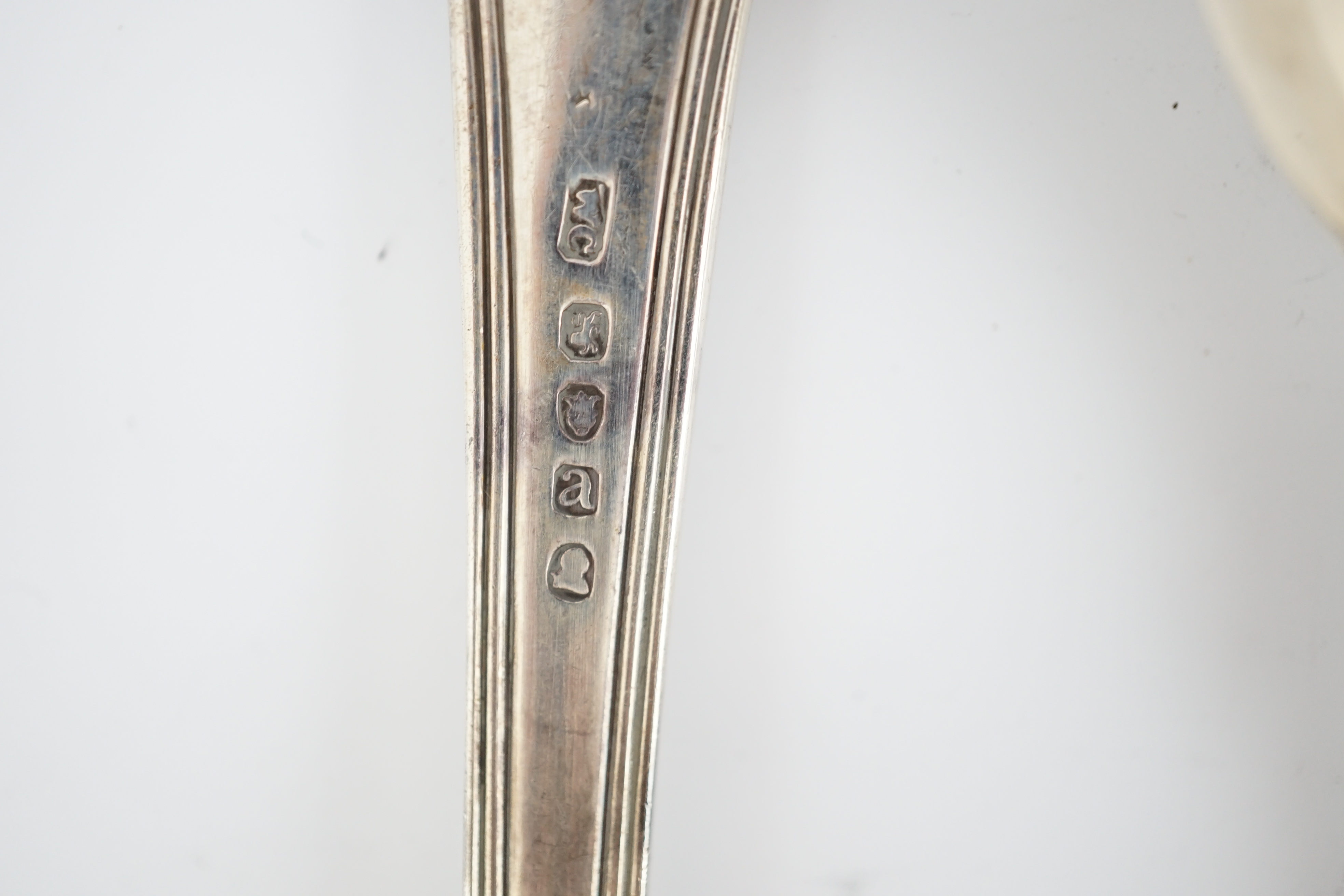 Two early 19th century silver fish slices, Charles Boyton, London, 1831 and Joseph & Albert Savory, London, 1846, largest 31.2cm, together with two 19th century silver basting spoons, William Chawner, London, 1816 and Ge